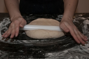 Extend dough with rolling pin